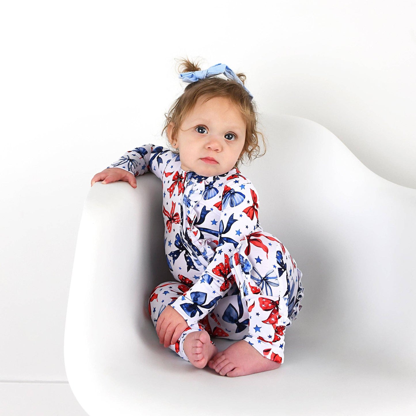 Eleanor Bows Ruffle Zip