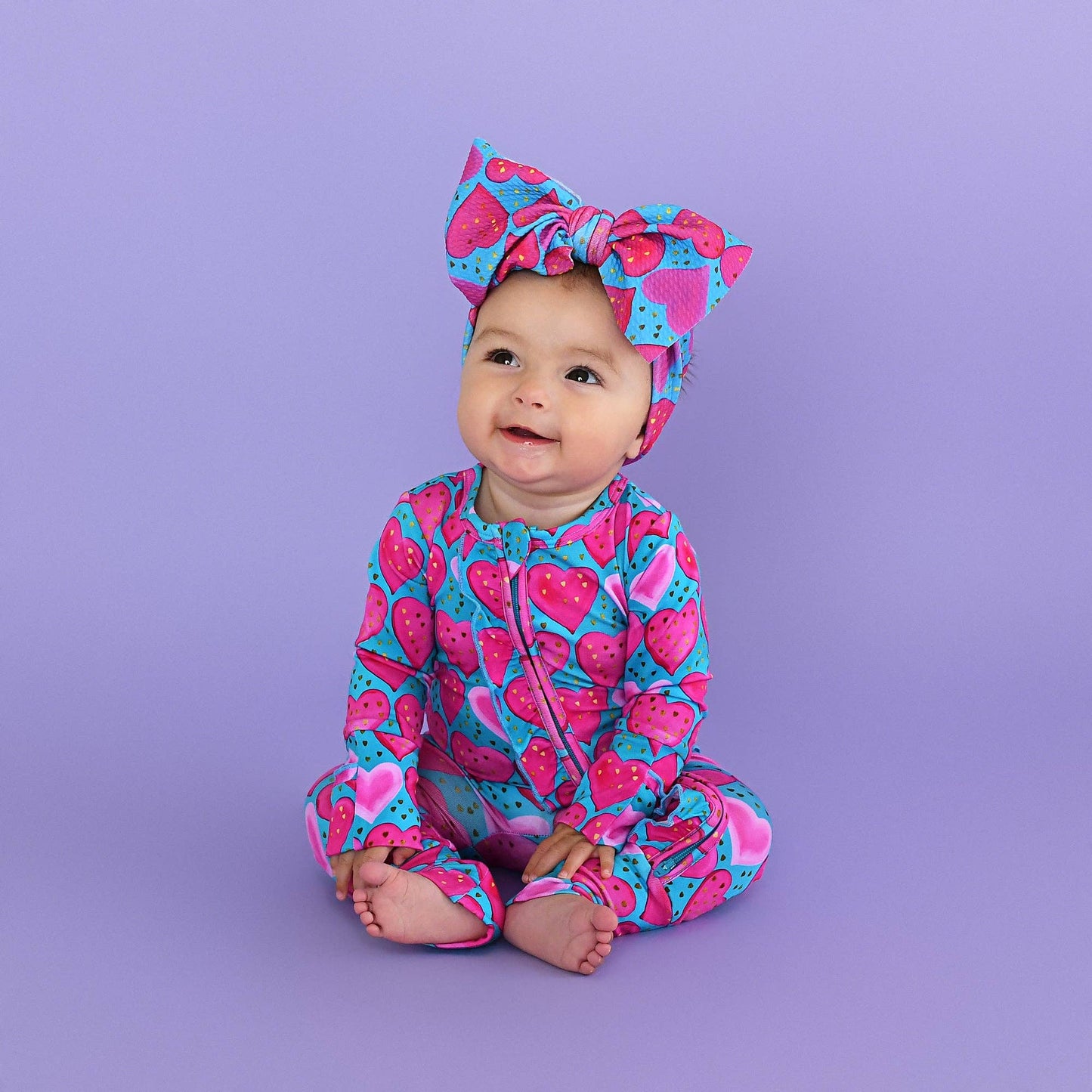 Alaina Heart Ruffle Zip