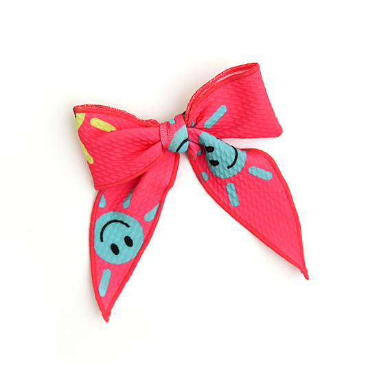 Brittany Smiley Face CLIP BOW