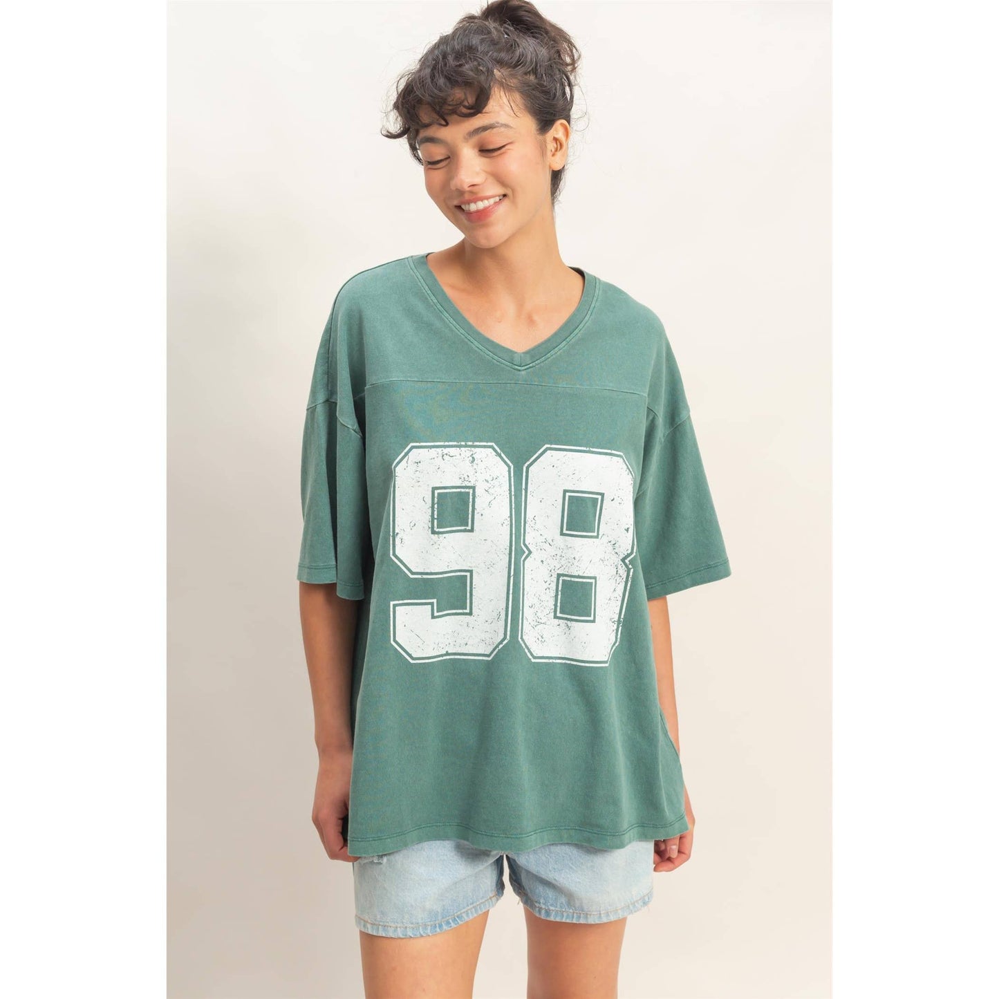 Oversized Varsity Style V-Neck Graphic T-Shirt