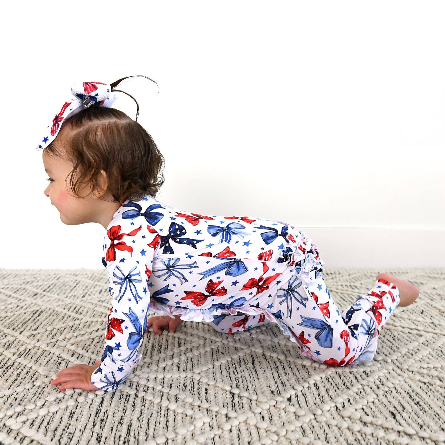 Eleanor Bows Ruffle Zip