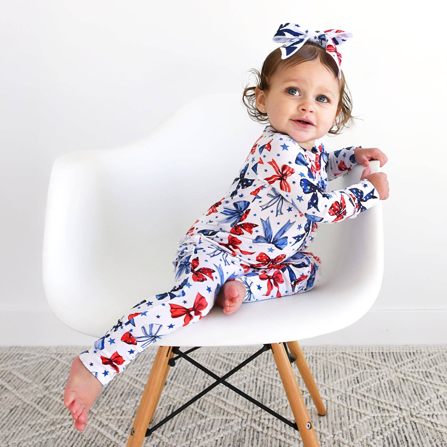 Eleanor Bows Ruffle Zip