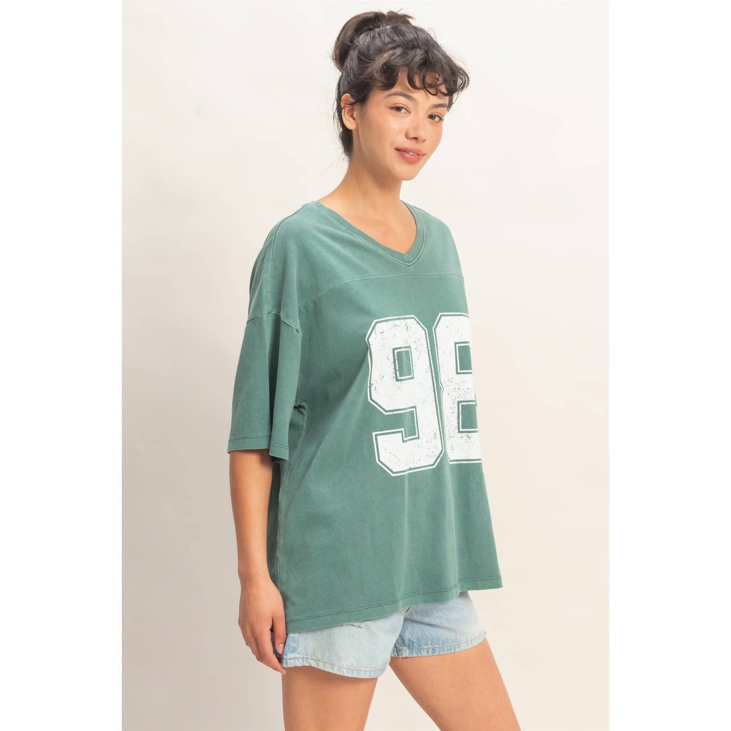 Oversized Varsity Style V-Neck Graphic T-Shirt