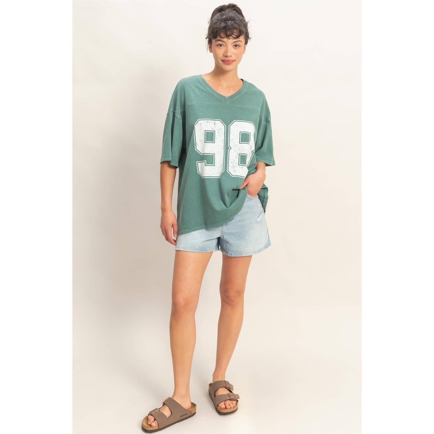 Oversized Varsity Style V-Neck Graphic T-Shirt