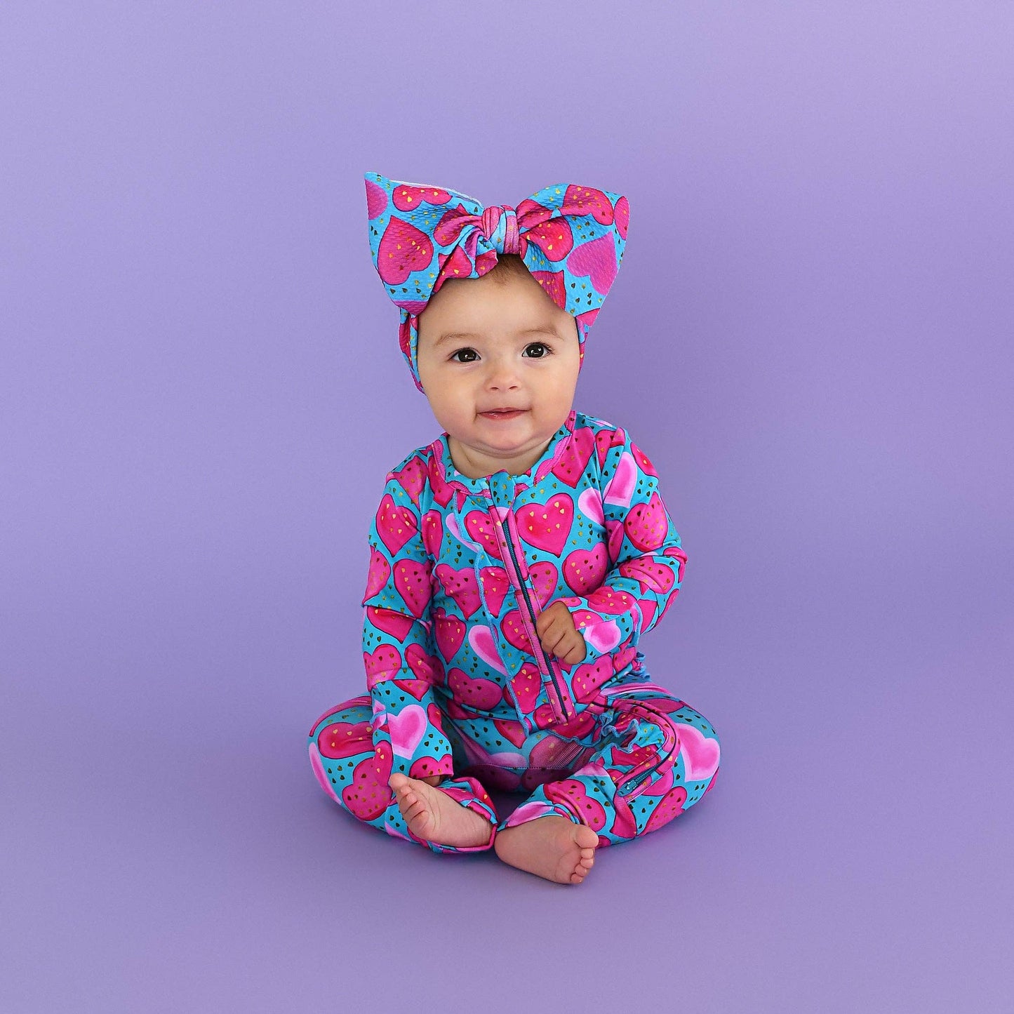 Alaina Heart Ruffle Zip