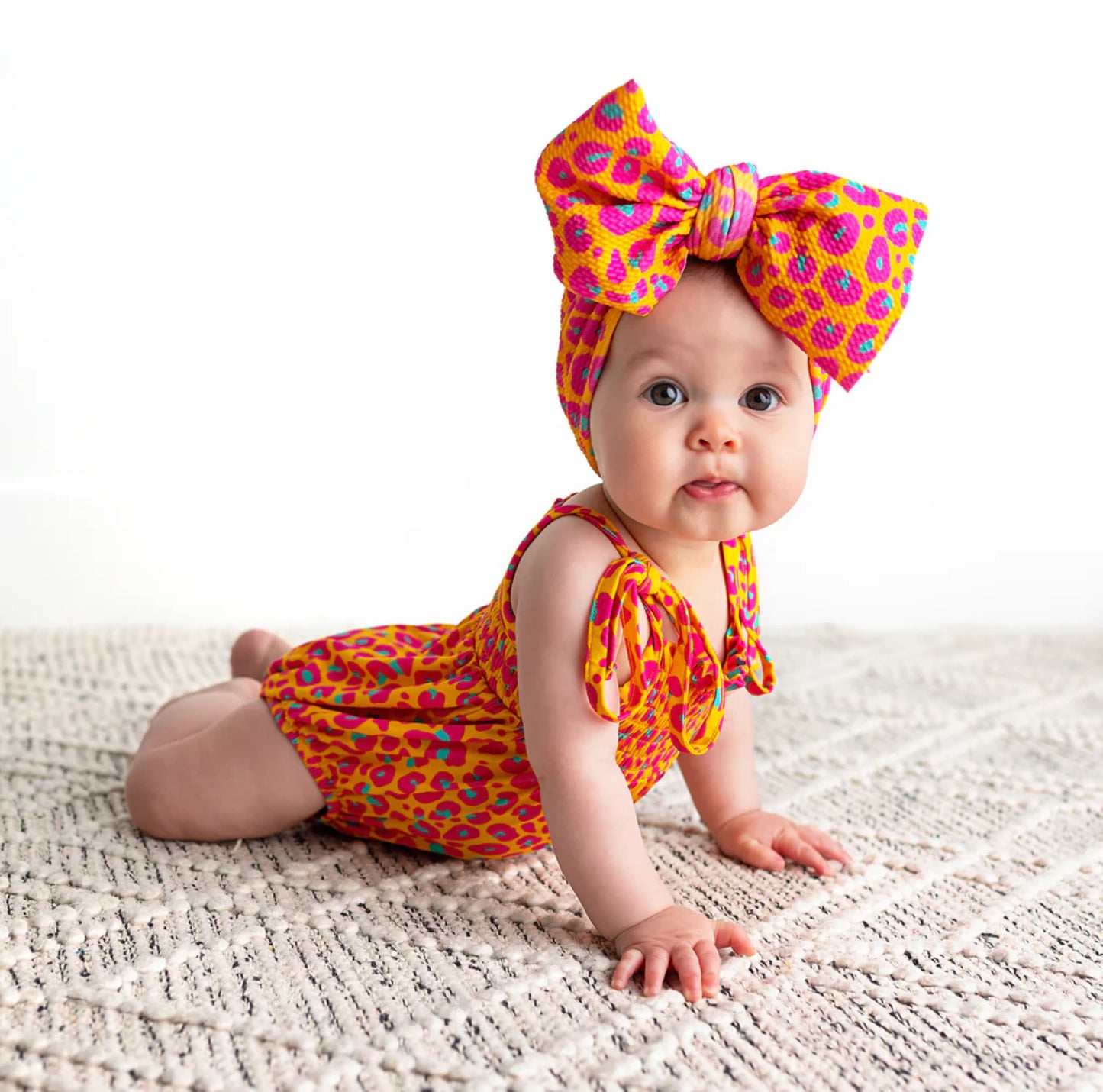 Kelly Leopard Smocked Bubble Romper by Gigi & Max