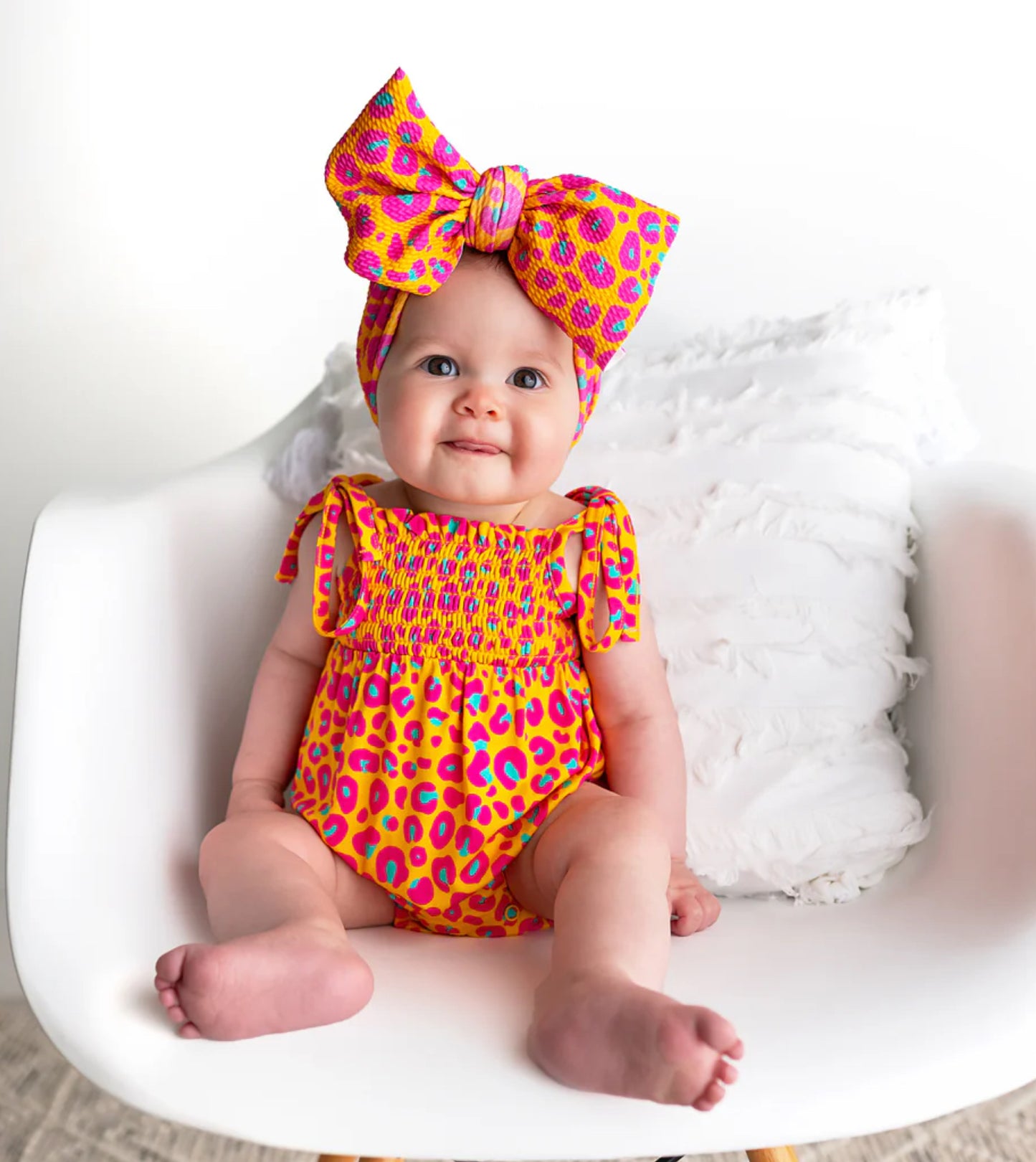 Kelly Leopard Smocked Bubble Romper by Gigi & Max